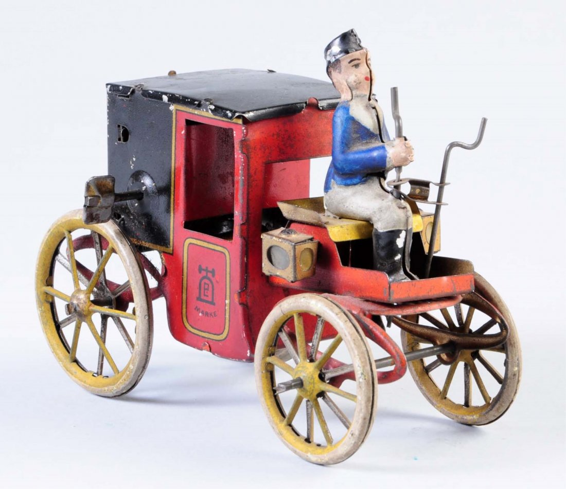 Lehmann Tin Wind-Up Wagon.: Early toy. Has some litho scratches. Includes original key and tin rider. Condition (Good - Very Good). Size 5" L.