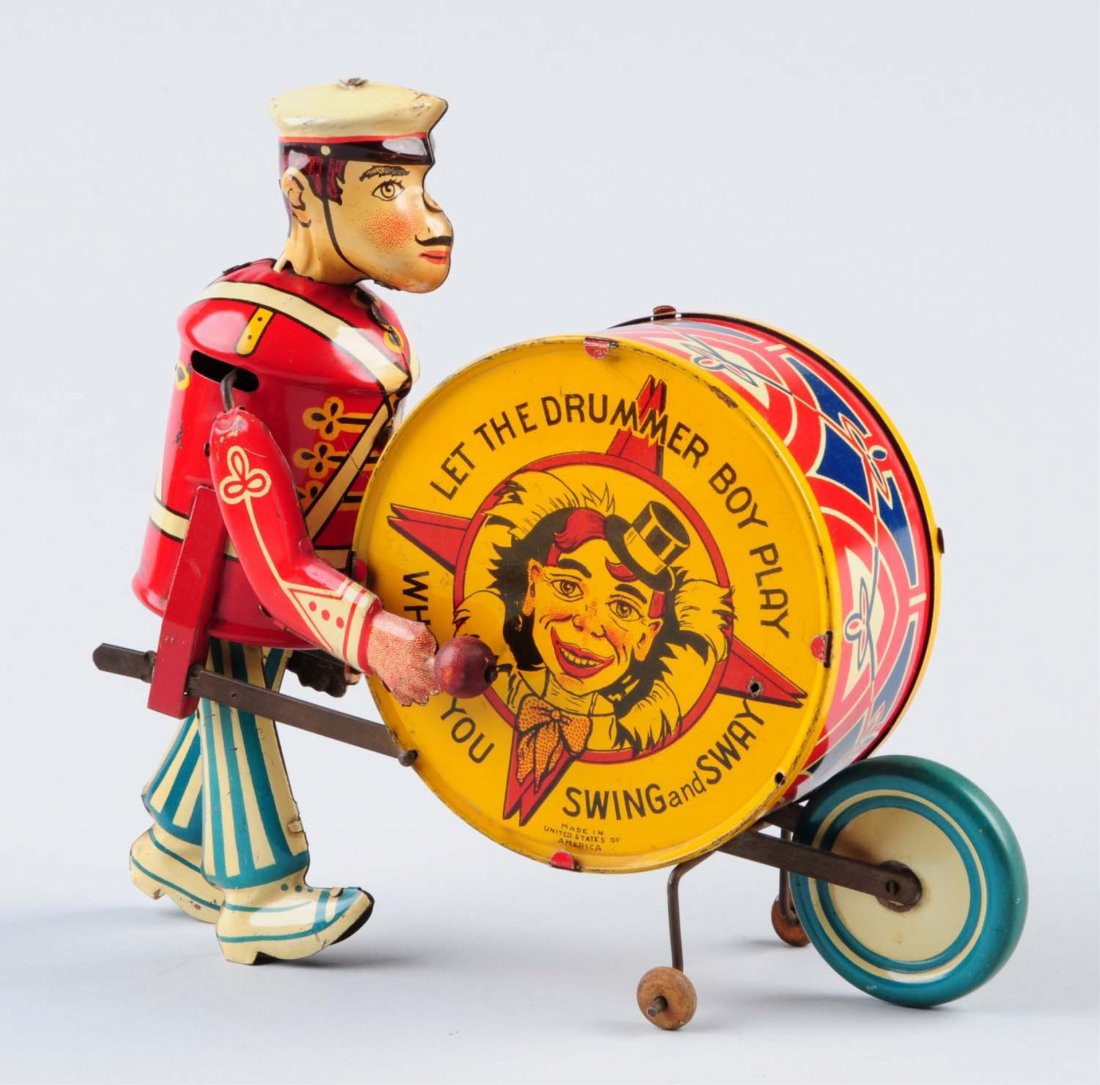 Marx Tin Wind-Up Drummer Boy.: Toy has very slight litho scratches around the edges of the tin drum and to the boy's shoes. Drummer boy has a moving head and arms, and includes his drumsticks. Condition (Very Good - Excellent). Siz