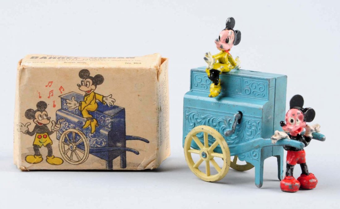 Mickey & Minnie's Barrel Organ With Music.: Includes original box; has slight creasing Some scratches to the pain to the organ, more significant scratches to Mickey and Minnie. Condition (Very Good - Excellent). Size 3" L.