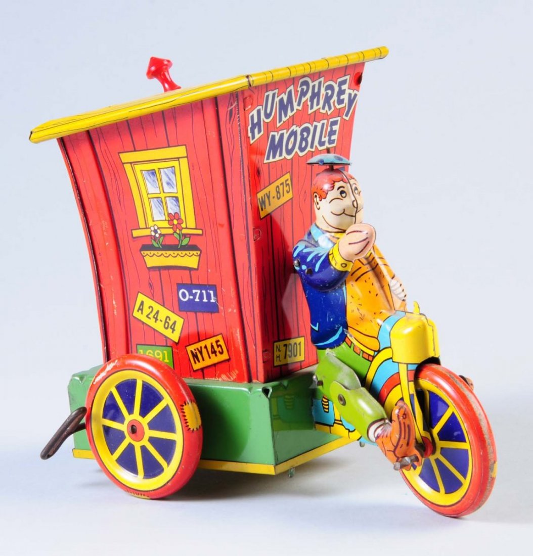 Tin Wnd-Up Humphrey Mobile.: Toy has minor scratches and one small dent. Condition (Very Good - Excellent). Size 9" L.
