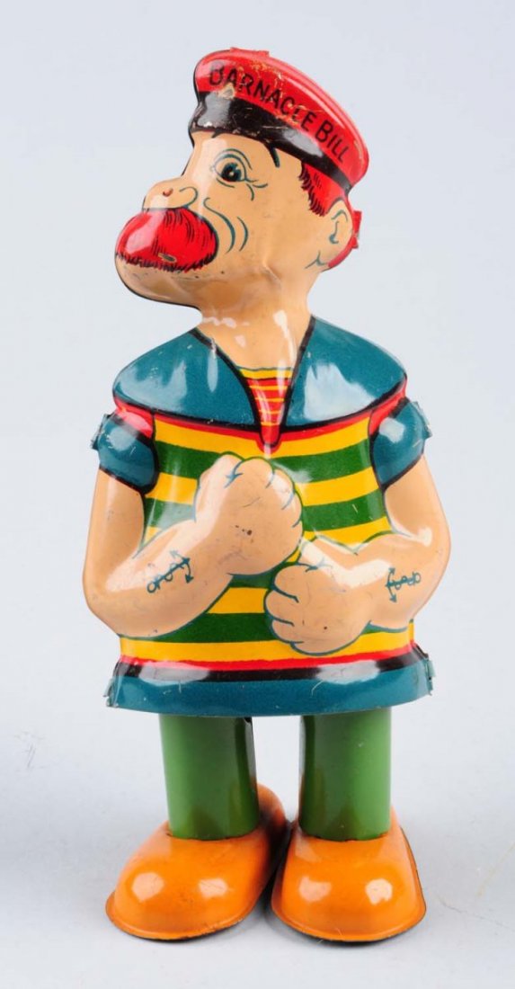 Tin Wind - Up Barnacle Bill.: Minor litho scratches. Includes original wind - up key. Condition (Excellent). Size 6 -1/2" T.