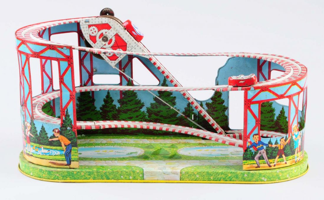 Tin Wind - Up Roller Coaster.: Has minor scratching throughout toy. Couple of spots with oxidation towards the bottom of toy on side panels. Otherwise has beautiful litho colors showing kids buying different types of foods at stand