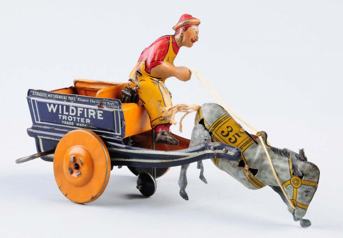 Tin Wind - Up Wildfire Trotter.: Has some litho scratches throughout. Includes original wind - up key. Condition (Good - Very Good). Size 8 -1/2" L.CORRECTION: One leg is missing and the others have been replaced. The ears have been 
