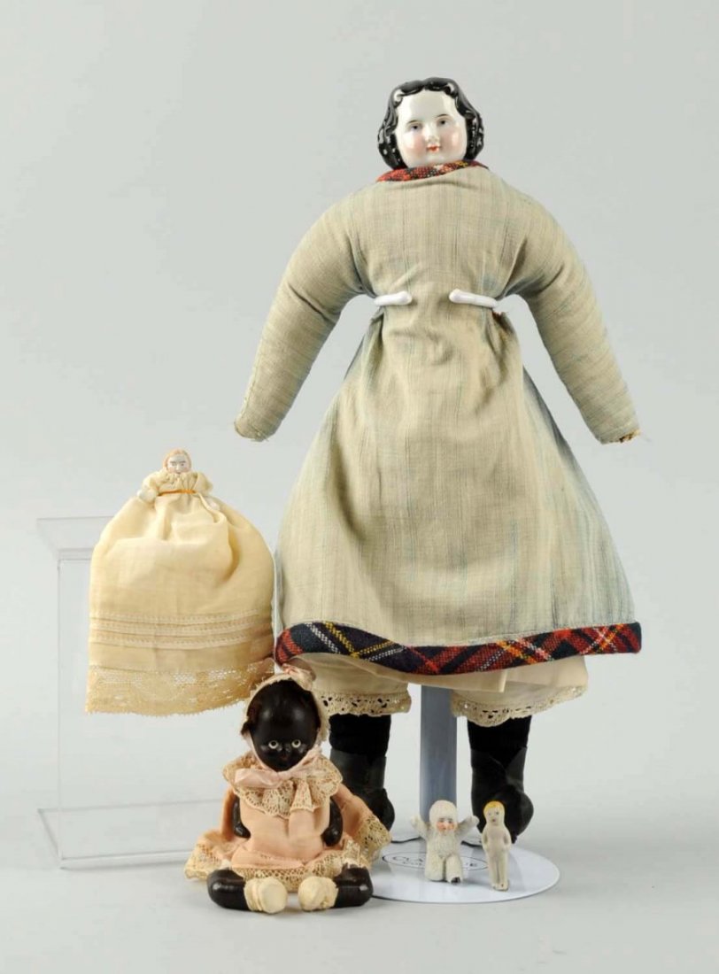 Lot of 5: Various Vintage Dolls.: Includes an antique snow baby, a black painted Japanese baby, a jointed bisque baby, a frozen Charlotte and a china head on homemade body. Head is broken, no shoulder plate. Japanese baby needs to be 