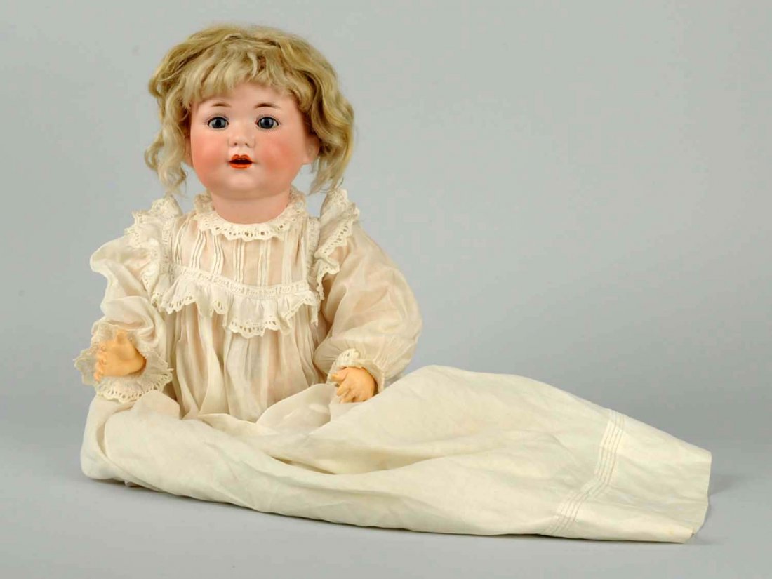 Antique German Character Bisque Head Baby.: Composition baby body. Mold AM #971. Sleep eyes and open mouth. Unusual crier design of body and head. Nice antique baby gown. Condition (Good). Size 17" T.