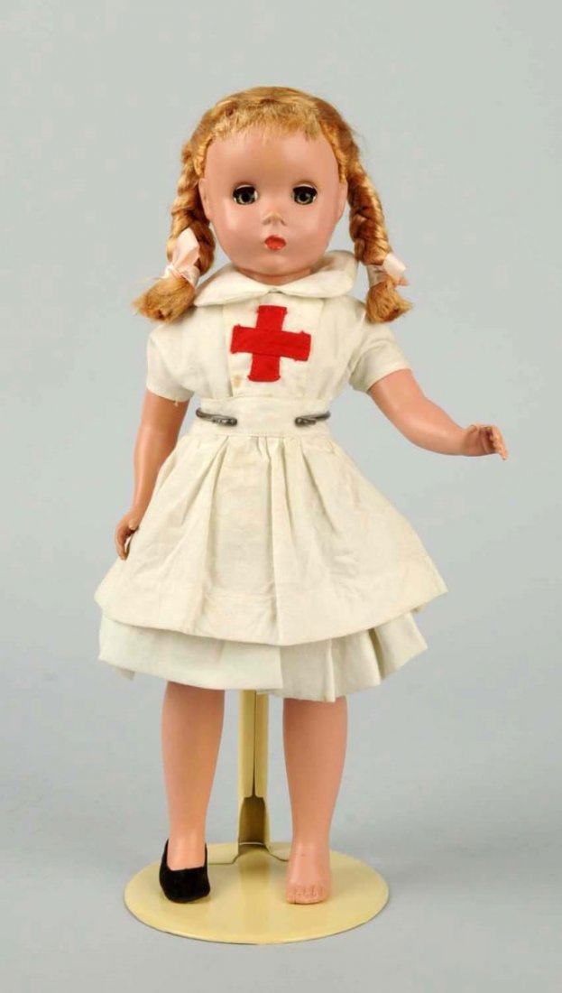 1950s H.P. Unmarked Alexander Doll.: Re-dressed as a nurse. Maggie face. Condition (Fair). Size 14" T.