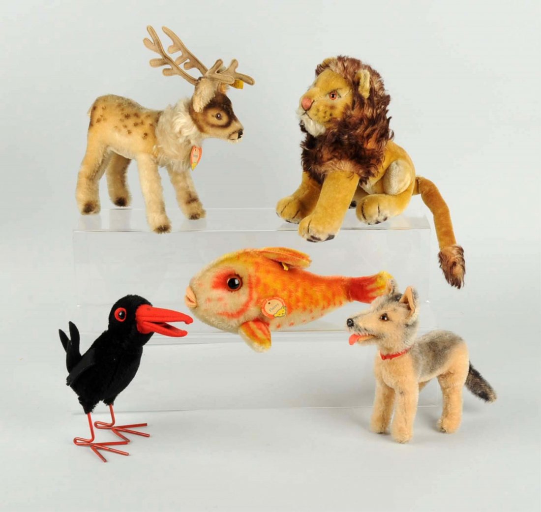 Lot of 5: Steiff Animals.: Includes four with buttons and one without. All have glass eyes. Condition (Good). Size Largest: 10" L.