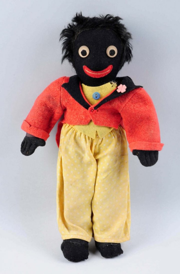 Vintage Early Cloth Golliwogg.: He has a felt face and cloth body and is unmarked. Has some moth holes in back of jacket and one on side of foot. Condition (Good). Size 14 - 1/2" L.