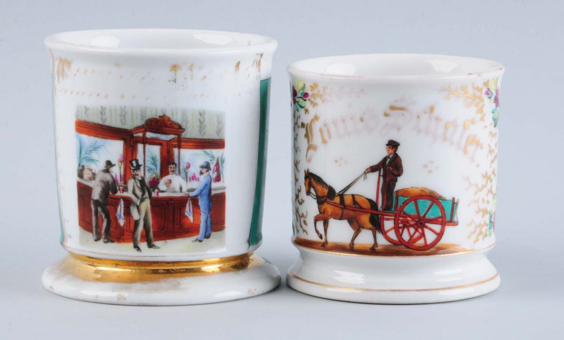 Lot of 2: Shaving Mugs.: With bar scenes. One with three men and marked "M.G. Fleming" and "Limoges" on the bottom. The other has four men at the bar, no damage, and a washed out name. Condition (Excellent).