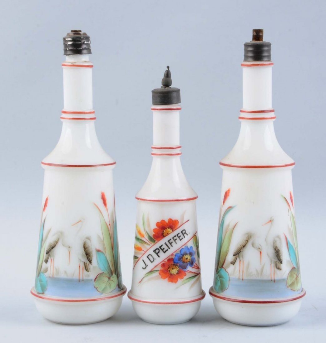 Lot of 3: Vintage Barber Bottles.: In hand painted milk glass. All have stoppers. Condition (Excellent). Size Largest: 10 - 1/2" T.