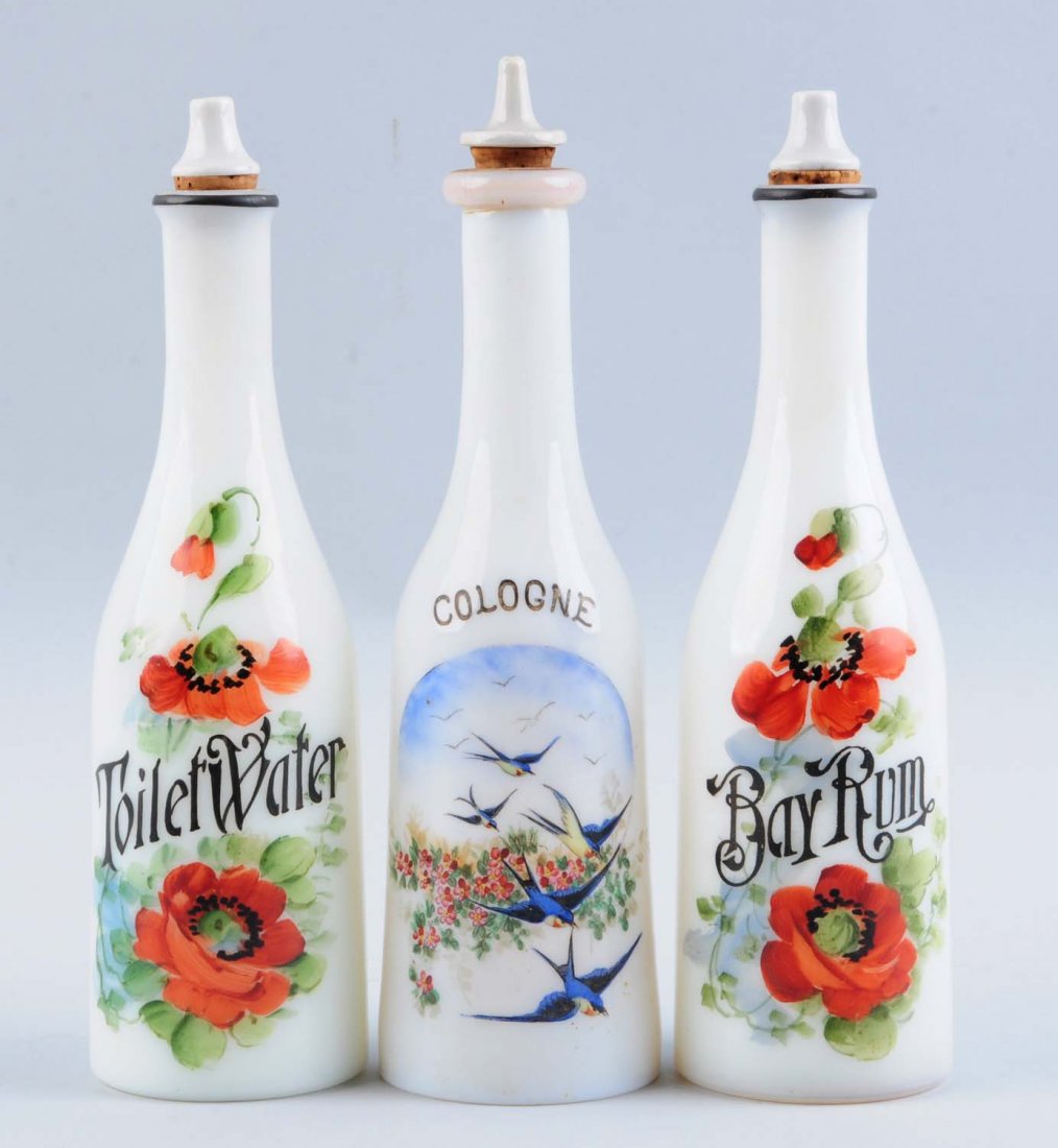 Lot of 3: Vintage Barber Bottles in Milk Glass.: Hand painted. All with stoppers. No damage. Condition (Excellent). Size Largest: 10" T.