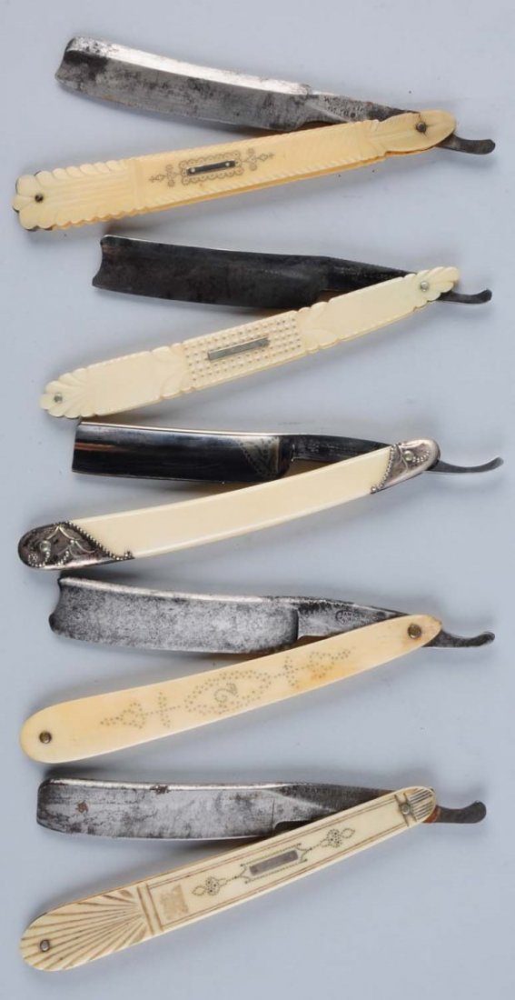 Lot of 5: Ivory Razors.: Includes a W. Smith Sligo circa 1800 carved ivory straight razor. There is a slight hair line on front scale by forward pin. Fine penning surrounds escutcheon. Second is a Kend Allizon circa 1820 carv