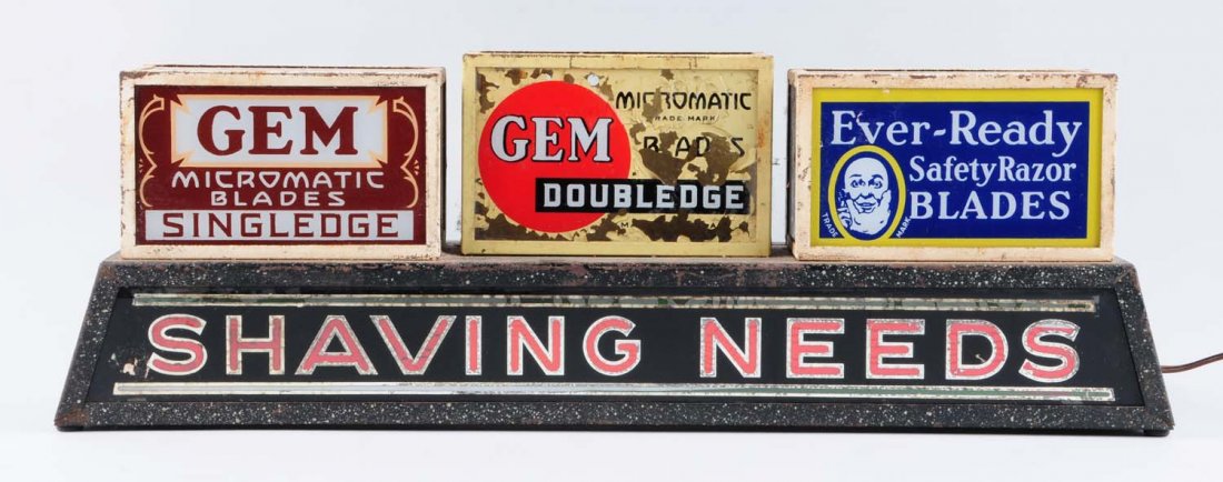 Barber Shaving Electric Sign.: Advertising Gem and Ever - ready razor blades. Reverse painting loss to the middle gem sign and general wear to the metal boxes. Condition (Excellent). Size 24" x 8 - 1/2".