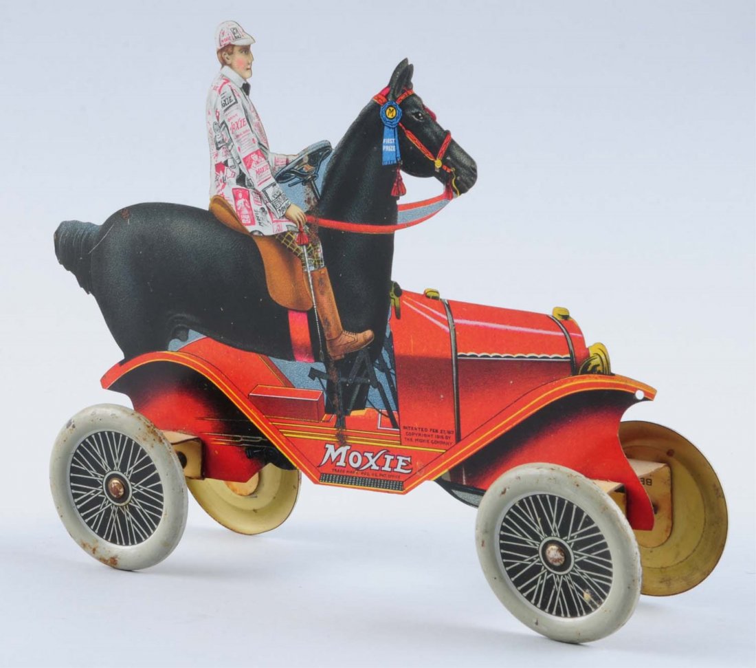 Moxie TIn Horse in Car Toy.: One side has a rust streak going from the steering wheel downward. A few rust spots on the wheels. Fairly clean otherwise. Condition (Very Good Plus). Size 8" L.