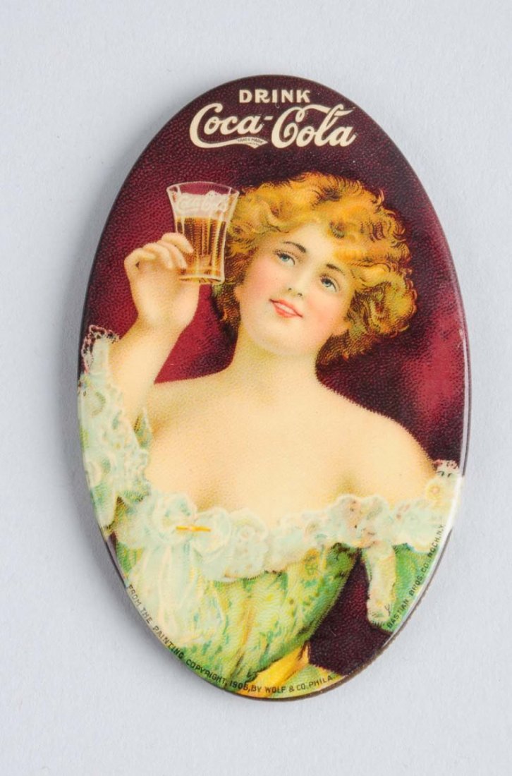 1907 Coca - Cola Pocket Mirror.: Great color, with light surface scratches and wear. Condition (Excellent). Size 3" L.
