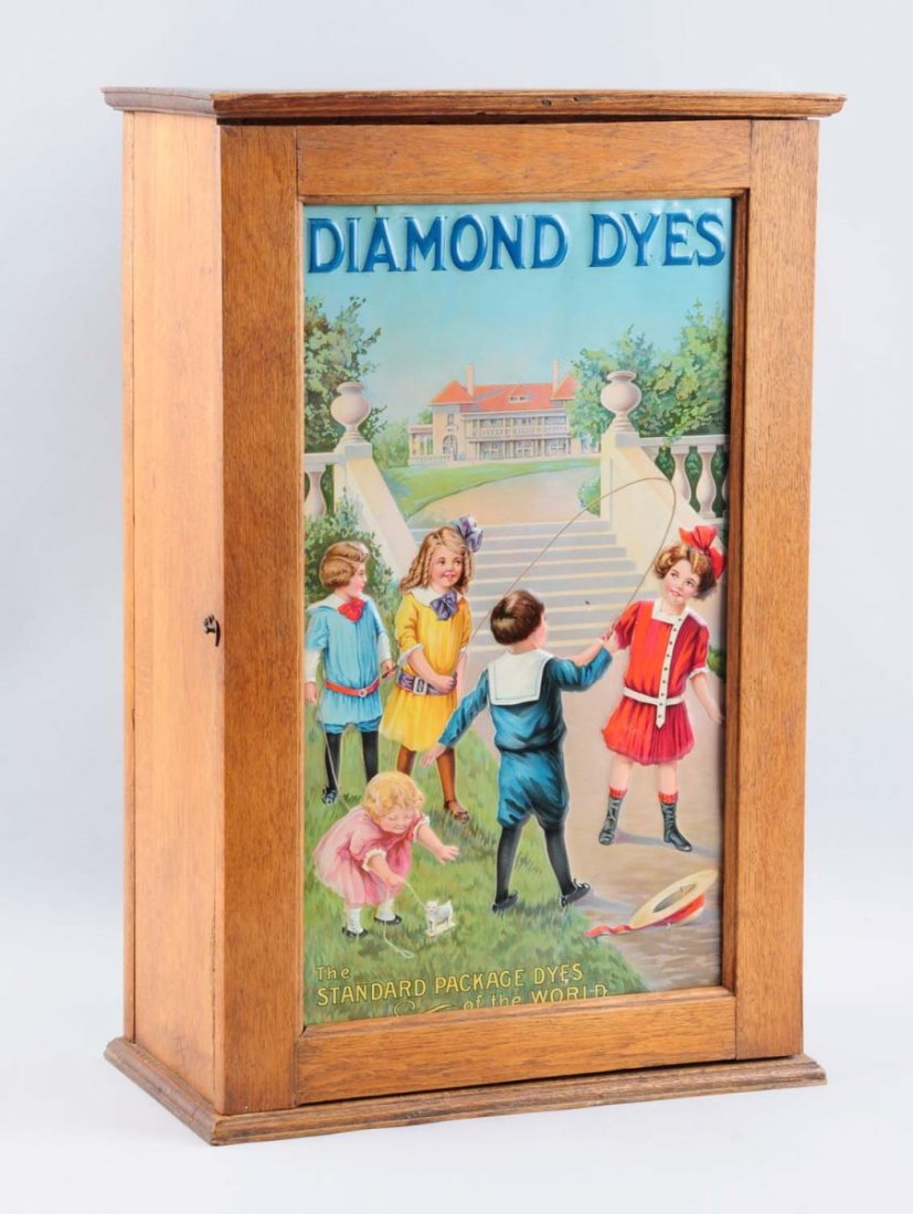 Mansion Diamond Dyes Cabinet.: Beautiful example, with a tin in strong color and only a few small marks and the lightest of wear. Wooden cabinet has a stain on top and mild wear. Condition (Excellent Plus). Size 24" T.