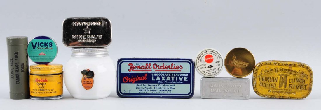 Lot of 10: Small Tins.: Eastman Kodak Company (1 oz. opaque black ink in bottle), Edwin B Stimpson and Son Thomson Slotted Clinch Rivet tin, Rexall Orderlies Chocolate Flavored Laxative, Remington Arm Percussion Caps, Luxcor