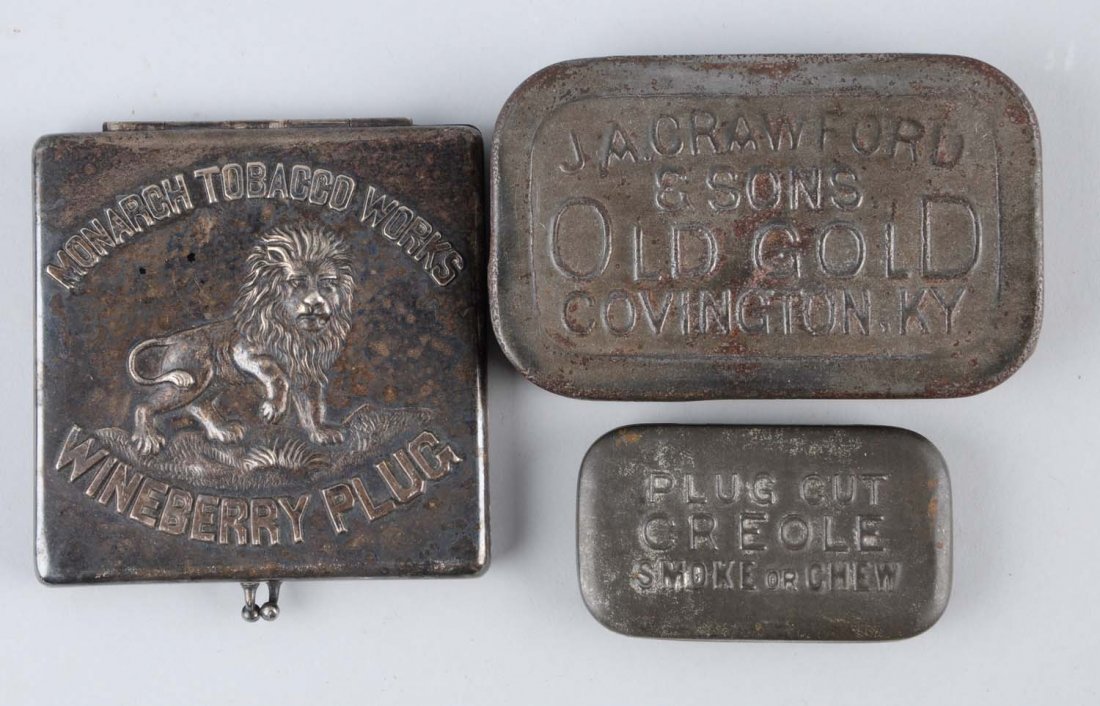 Lot of 3: Tobacco Tins.: J.A. Crawford and Sons old Gold, small Creole Smoke or Chew, and Monarch Tobacco Works Winberry Plug with embossed lion on lid. Condition (Good - Excellent Plus). Size Largest: 3 - 1/2" L.