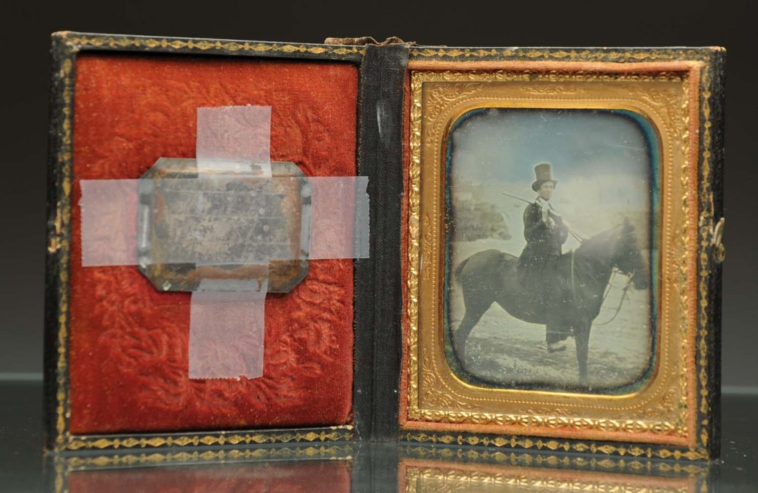 Daguerreotype of J. Young on Horse.: 1/6 plate with plate identifying the hunter in outdoor scene. Clear image in leather case with new binding. Condition (Excellent). Size 6 - 1/2" L.CORRECTION: Plate identifies man as "Mr. J. Young on 