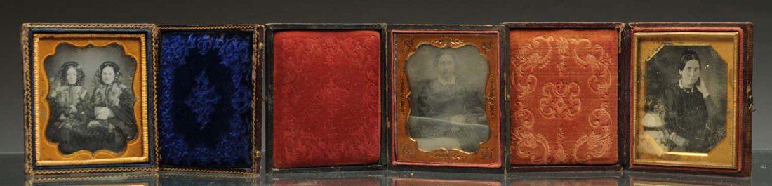 Lot of 3: Daguerreotypes.: 1/6 plates in leather cases. The first has a woman with her hand to her face, the second has sister with furs and fancy dresses, and the third has a woman with crossed hands. Clear images. Condition (