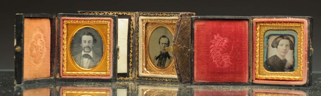 Lot of 3: 1/16 Plates.: Lot includes: a daguerreotype of a young woman in a leather case, clear image, binding separated; a daguerreotype of a young man in a leather case, clear image; and a ambrotype of a bearded gentleman 
