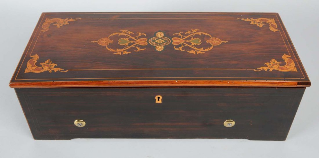 Nicole Freres Keywind Music Box: Circa 1850's. SN-33420. From the collection of Rita Ford Music Boxes, this fine early key-wind music box playing 12 tunes was made by Nicole Freres. This is a fat cylinder box that is 3 - 1/8” diame