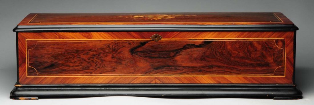 Sublimette 12 Airs Cylinder Music Box.: With tune card. 16 - 3/8" lg cylinder. Comb is excellent with all tips and teeth in tact. Pins look good on the cylinder. The case has been refinished. There is an approximate ten inch crack in the li