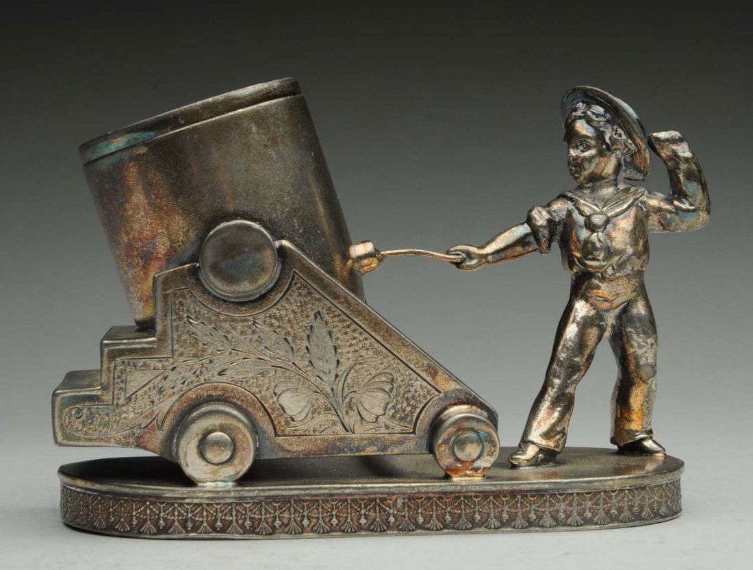 Figural Toothpick Holder.: Of boy shooting cannon by Reed and Barton No. 276. Condition (Excellent). Size 5" L.