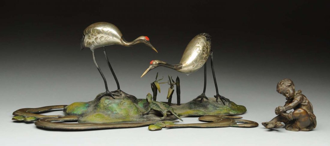 Lot of 2: Metal Pieces.: One is a bronze child, marked German. The other is a pair of metal statue with emu's and a turtle on a pond. Condition (Excellent). Size 9" L.