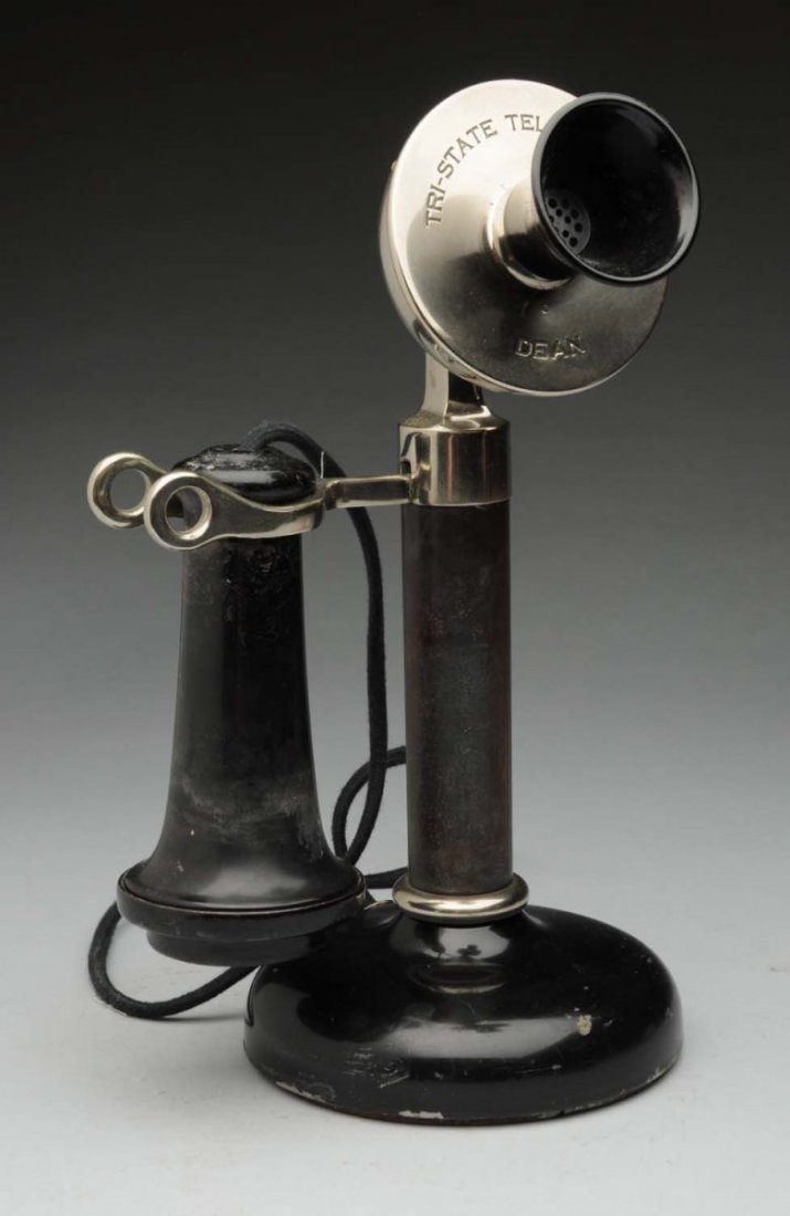 Tri-State Dean Candlestick Phone.: Black base and shaft, the rest is nickel. Metal receiver. Transmitter faceplate marked "Tri-State Tel & Tel Co. Dean". Condition (Excellent). Size 10 - 1/2" T.