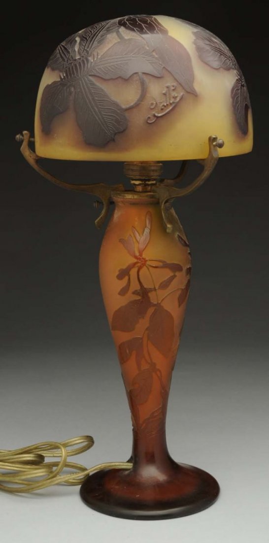 Cameo Art Glass Lamp.: Signed "Galle" on shade. Chips to the bottom and top of base. Rewired. Condition (Very Good). Size 14" T. 6" Dia. shade.