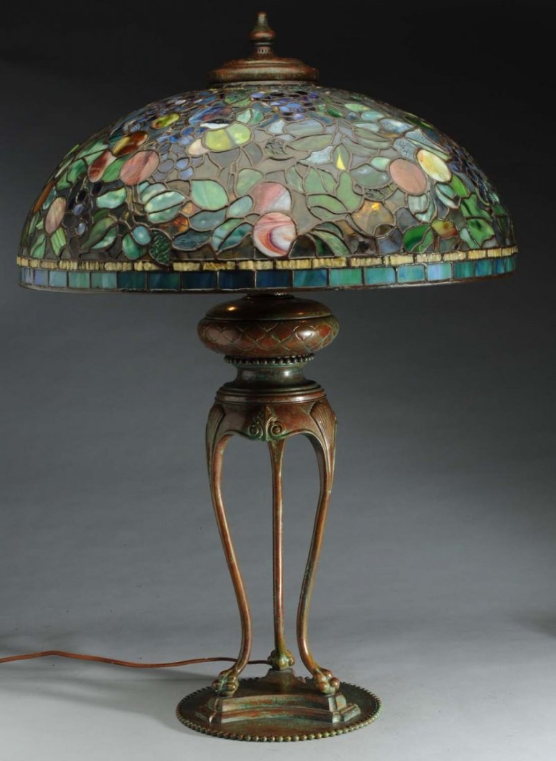 Reproduction Tiffany Lamp: Fruit Shade.: 1960's reproduction signed Tiffany Studios New York Fruit shade, no. 1519, with signed reproduction Tiffany base. Condition Excellent Size Shade 24" D.