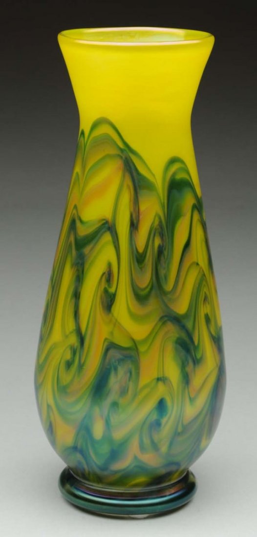 Loetz Yellow Phanomen Vase.: Fantastic Loetz Phanomen vase in iridescence lemon yellow with a pulled swirl decor in blue, green and red. Unusual pattern with eye catching colors. Condition (Excellent). Size 8 - 1/2" T.