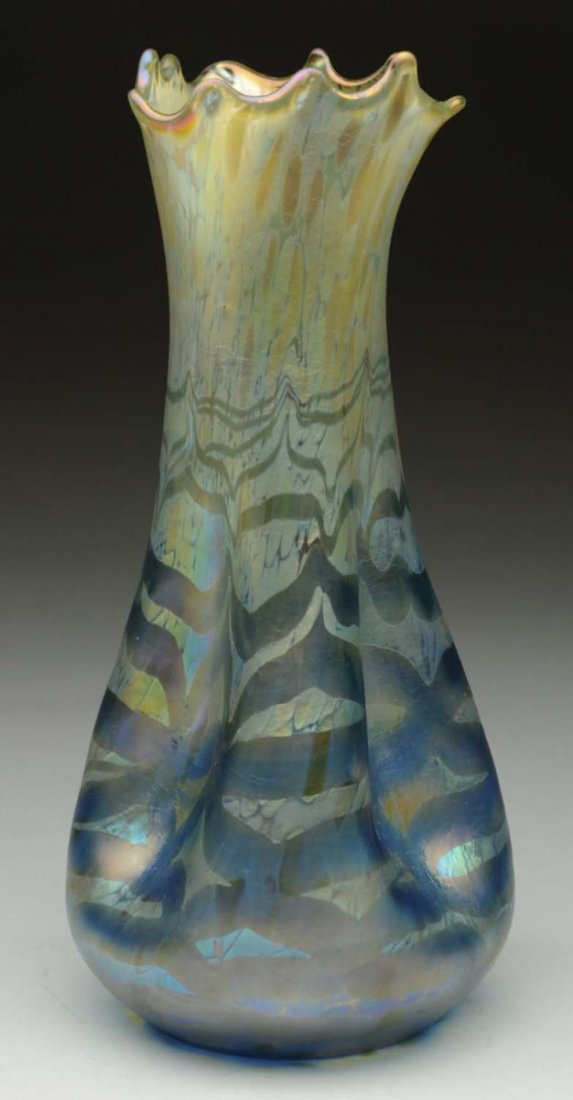Very Rare Loetz Maximia Vase.: Very rare Loetz vase in maximmia decor with twisted pinch form body and organic rim. Decorated with a candia papillion back round overlaid with a blue wave form pattern. Polished pontil and fire polis
