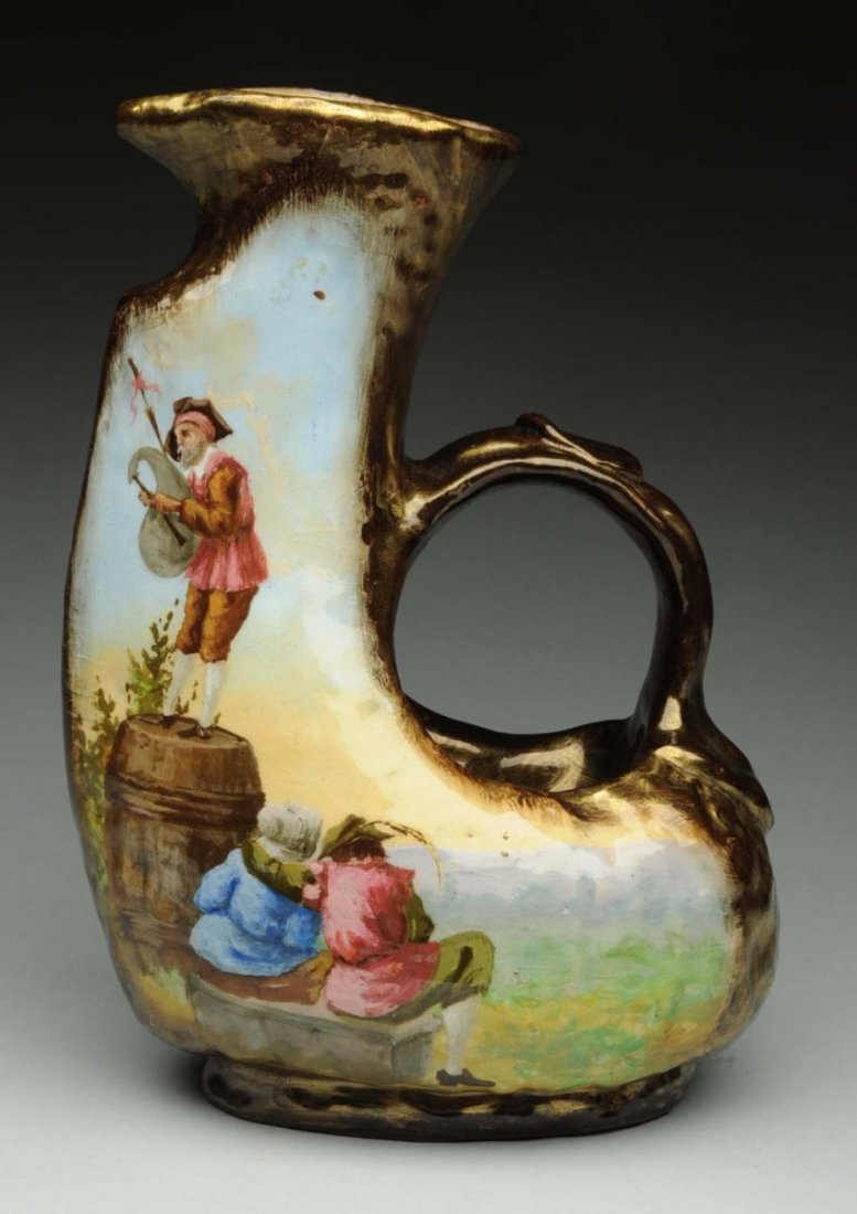 Galle Pottery Pitcher.: Depicted man playing bagpipes. Signed E. Galle Nancy. No chips, cracks or damage. Condition (Excellent). Size 10" T.CORRECTION: This comes with a COA signed by the artist. It is a numbered limited edi