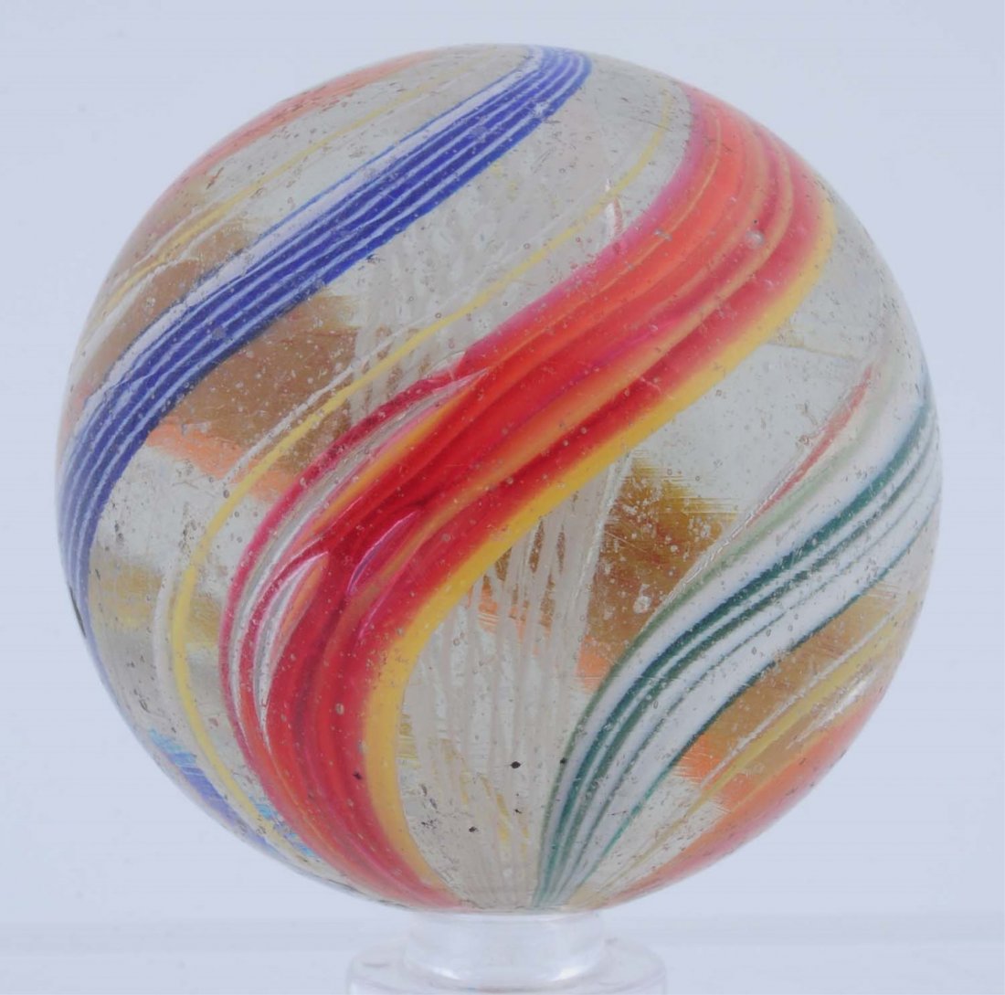 Large White Latticino Swirl Marble.: White latticino core with multicolor outer decoration. As made small surface indentation and pocket wear. Faceted pontil. Condition (8.9). Size 2 - 1/32" Dia.