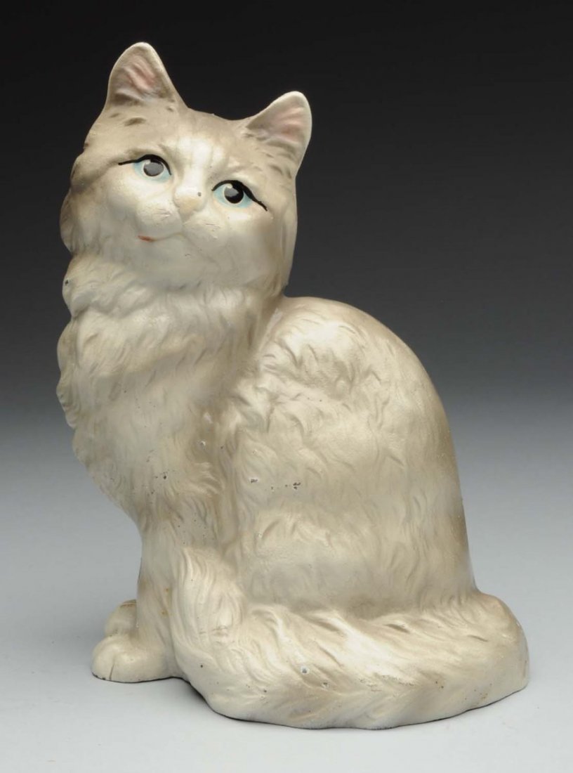Cast Iron Sitting Cat Doorstop.: Made by Hubley. Full-figure. Familiar pose of sitting tabby grey cat. Condition (Excellent Plus). Size 9" T.