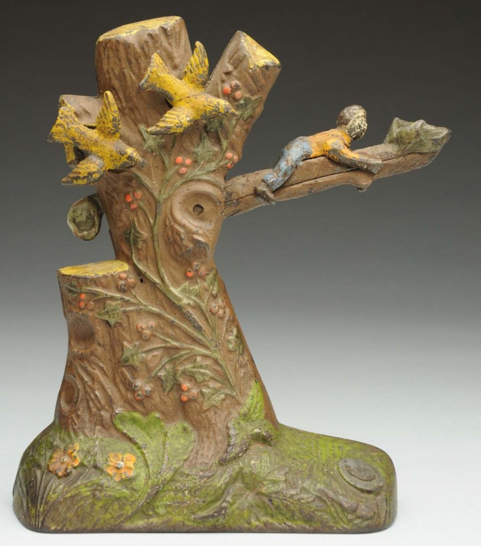 Boy Robbing Bird's Nest Mechanical Bank.: Manufactured by J. E. Stevens & Co. Original working condition. Condition (Very Good). Size 8" T.