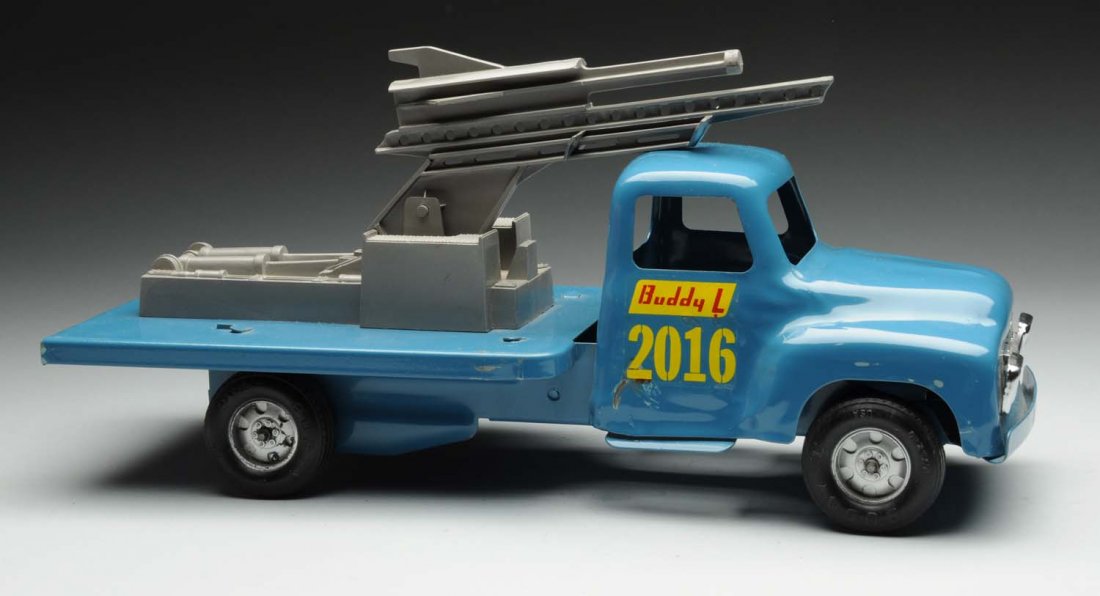 Pressed Steel Buddy L. Missile Launcher Truck.: This scarce truck comes with original box; marked "Buddy L. No. 5547 Missile Launcher". Nice "Buddy L." decals on sides of cab and marked "2016". Has back mechanism for launching missiles, missing ori