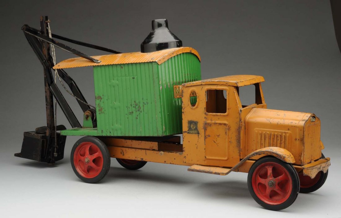 Steelcraft Marion Steam Shovel Truck.: This pressed steel push toy is in all original condition. "Marion" decal on back of steam shovel part. "Little Jim Playthings Jc Penney" decals on both sides of cab. Unusual spoked wheels. Back of tru