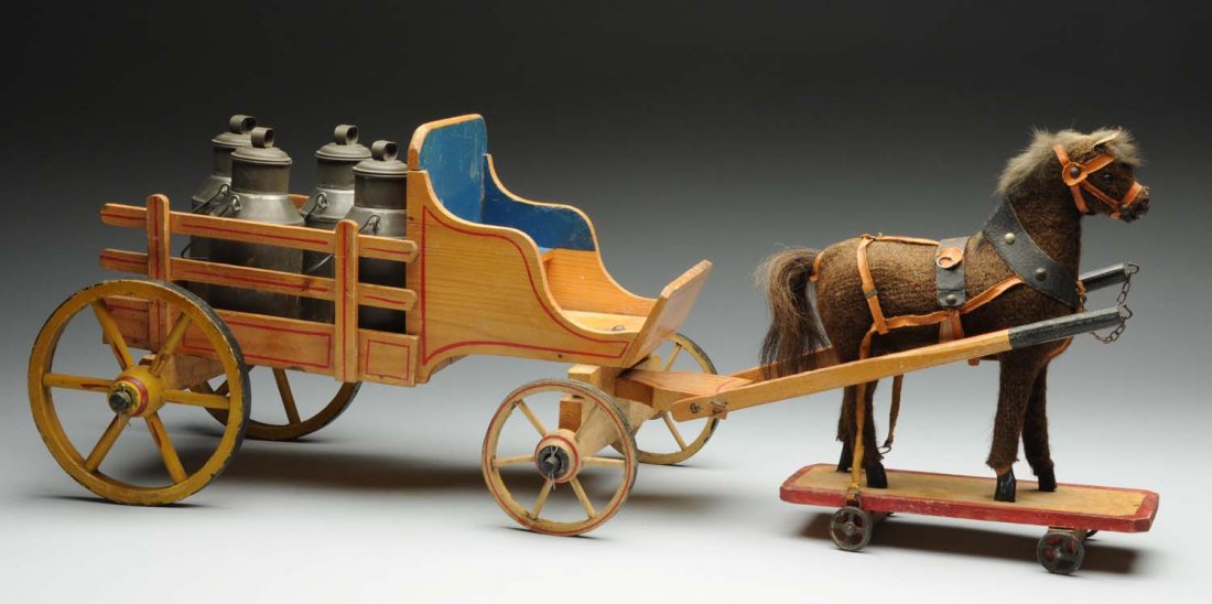 Early German Horse Drawn Milk Wagon Toy.: Has one Hide-covered horse, pulling elaborate wooden cart holding four original tin milk cans with lids. Marked "Germany" bottom of platform. Cart and wheels are made of wood. Very little wear. Condit