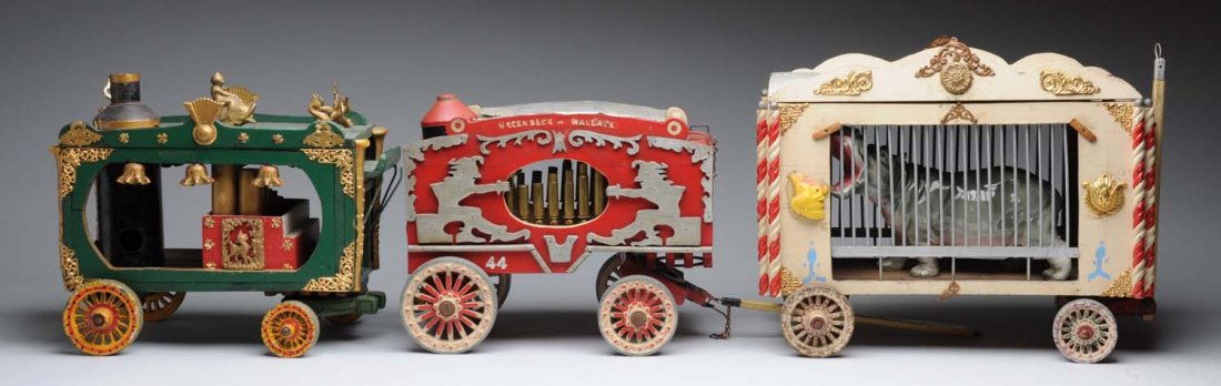 3 Pc. Folk Art Carved Wooden Circus Wagons.: Includes animal cage with hippopotamus which looks to be ceramic, a calliope wagon, and a bandwagon. Hand crafted by Edgar Decker Kirk of Harrisburg between 1910 - 1956 and was on display at various p