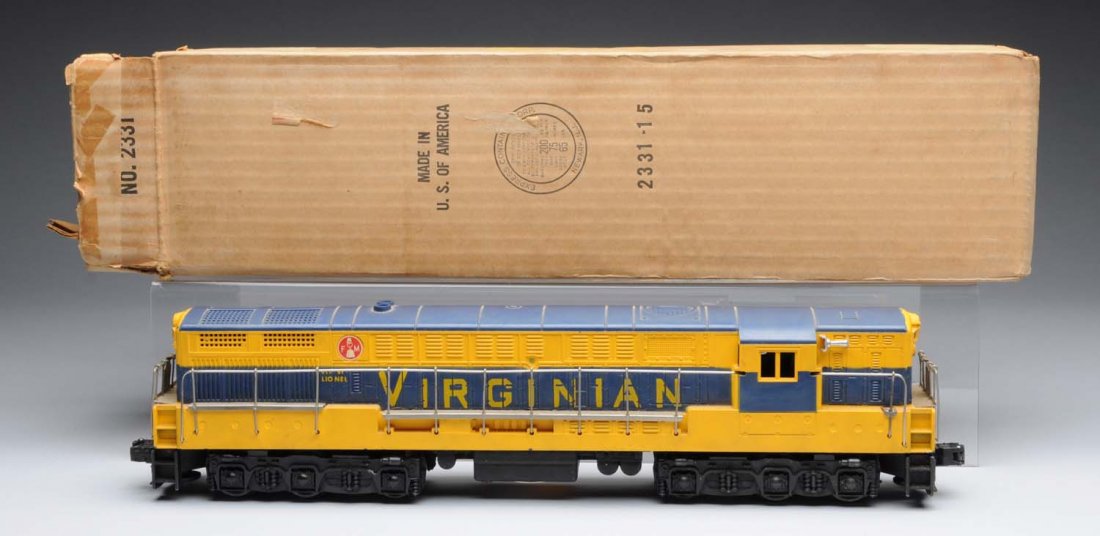 Lionel Post-War Virginian Fm Train Engine.: Includes original box with cardboard insert and Lionel paper. One small quarter inch line on end screw due to tightening, but is not cracked. Engine itself has been run. Could be cleaned to a better g
