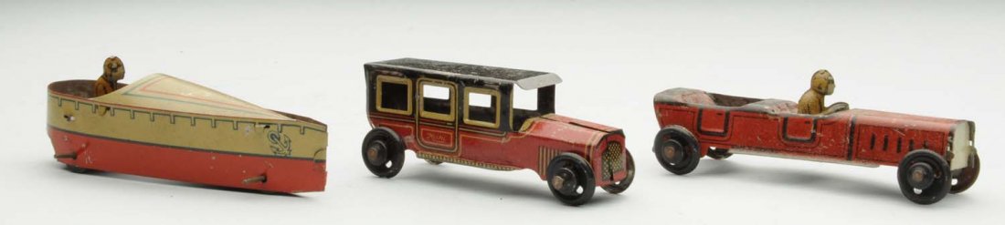 Lot of 3: German Tin Litho Penny Toys.: Lot of 3: speed boat with lithograph driver, open touring car with lithograph driver, closed car marked "Huki". General overall wear. Condition (Very Good - Excellent). Size Largest : 4" L.