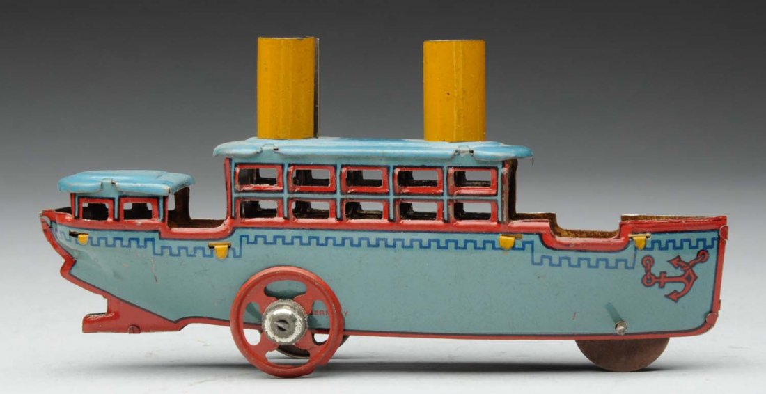 German Tin Litho Steam Boat Penny Toy.: Very unusual color combination; tri colored blue, red and has yellow stacks. Very little wear. Condition (Near Mint). Size 4 - 1/2" L.