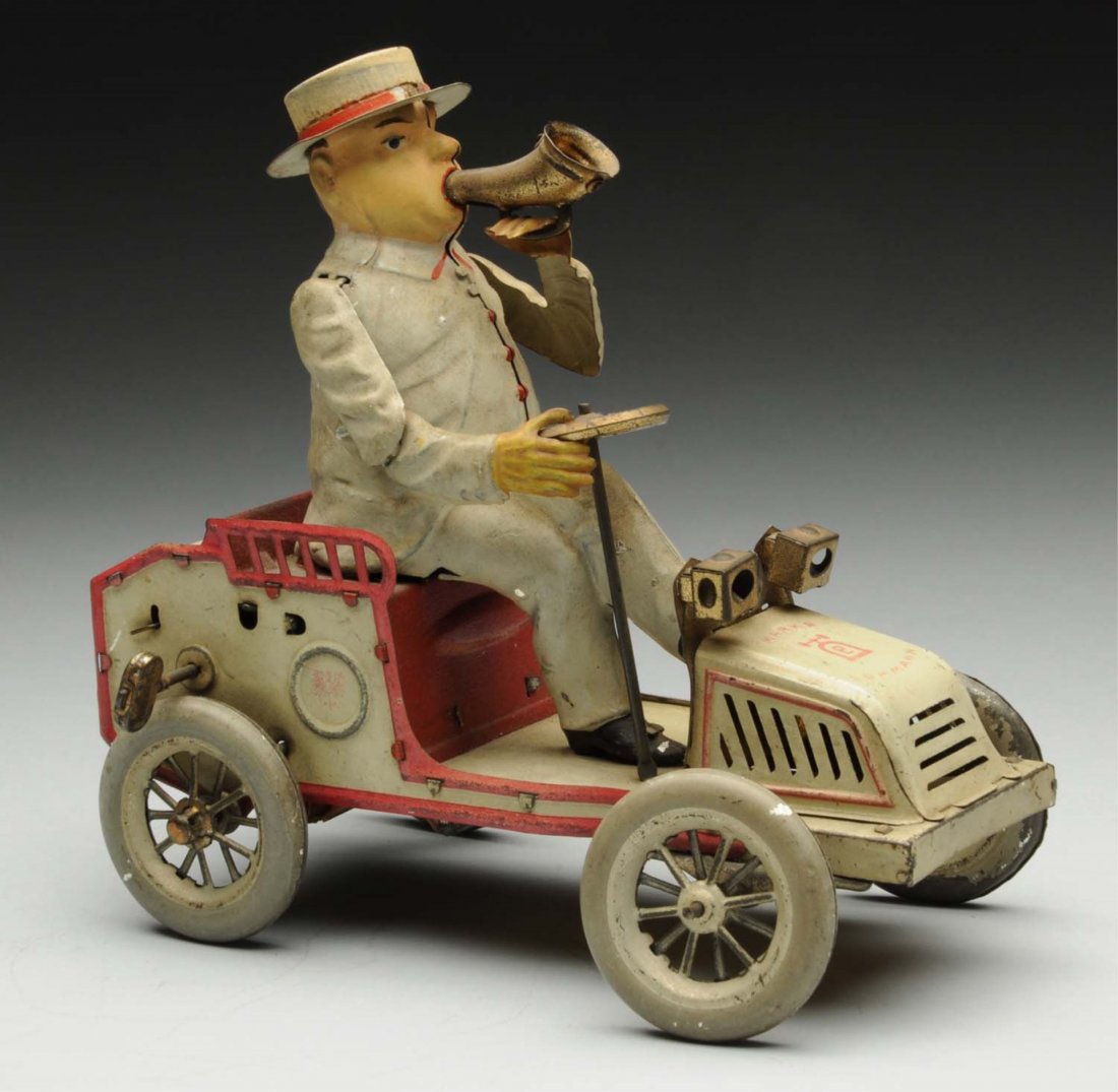 Lehmann Tin Litho Wind-Up Tut Tut Toy.: German. All original, including front headlights. Does not work and needs a good cleaning. Some litho loss, especially to wheels, and oxidation to bare metal parts. Condition (Very Good). Size 6 - 3/4