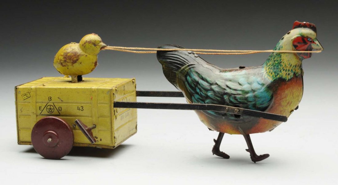 German Tin Litho Wind-Up Rooster & Chick Toy.: Made by Hans Eberl. Marked "Gik-Gak" and "Made in Germany". Nice colorful litho. Minor scratching and wear. Condition (Very Good - Excellent). Size 9" L.