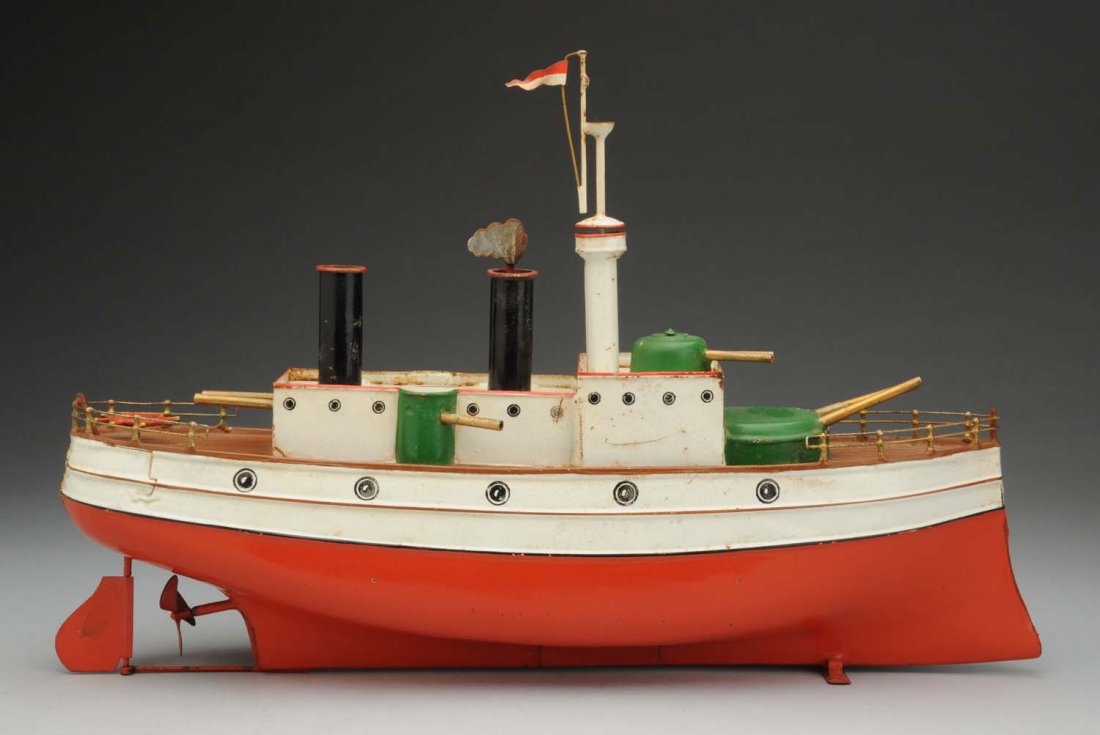Early German Carette Toy Gun Ship.: Includes several cannons. Minor wear. Condition (Very Good). Size 16" L.