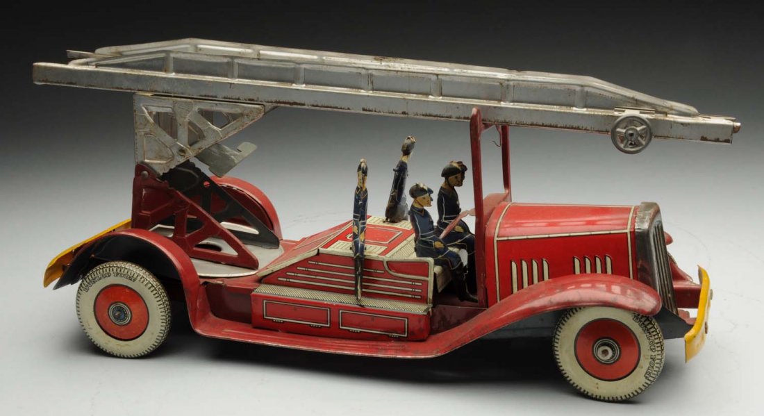 English Tin Litho Wind-Up Fire Ladder Toy.: Marked "Made in England" on sides of hood. Toy includes four tin litho firemen and original ladder. Toy has some oxidation and wear to fenders. Condition (Very Good). Size 14 - 1/2" L.