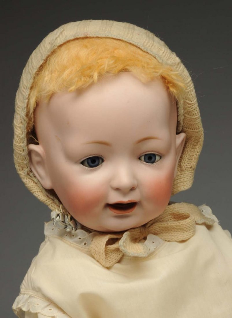 Life-Size Kestner Baby Doll.: German bisque socket head incised “Q made in Germany 20 211 JDK” with sleeping eyes, light multistroked eyebrows, open mouth with two lower teeth, replaced wig; composition baby body (not Kestner,